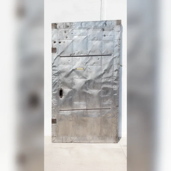 An20angled20metal20fire20door20with20a20single20panel - ANTIQUITIESWAREHOUSES